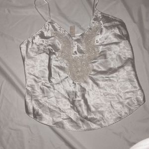 White top with white flower embroidery